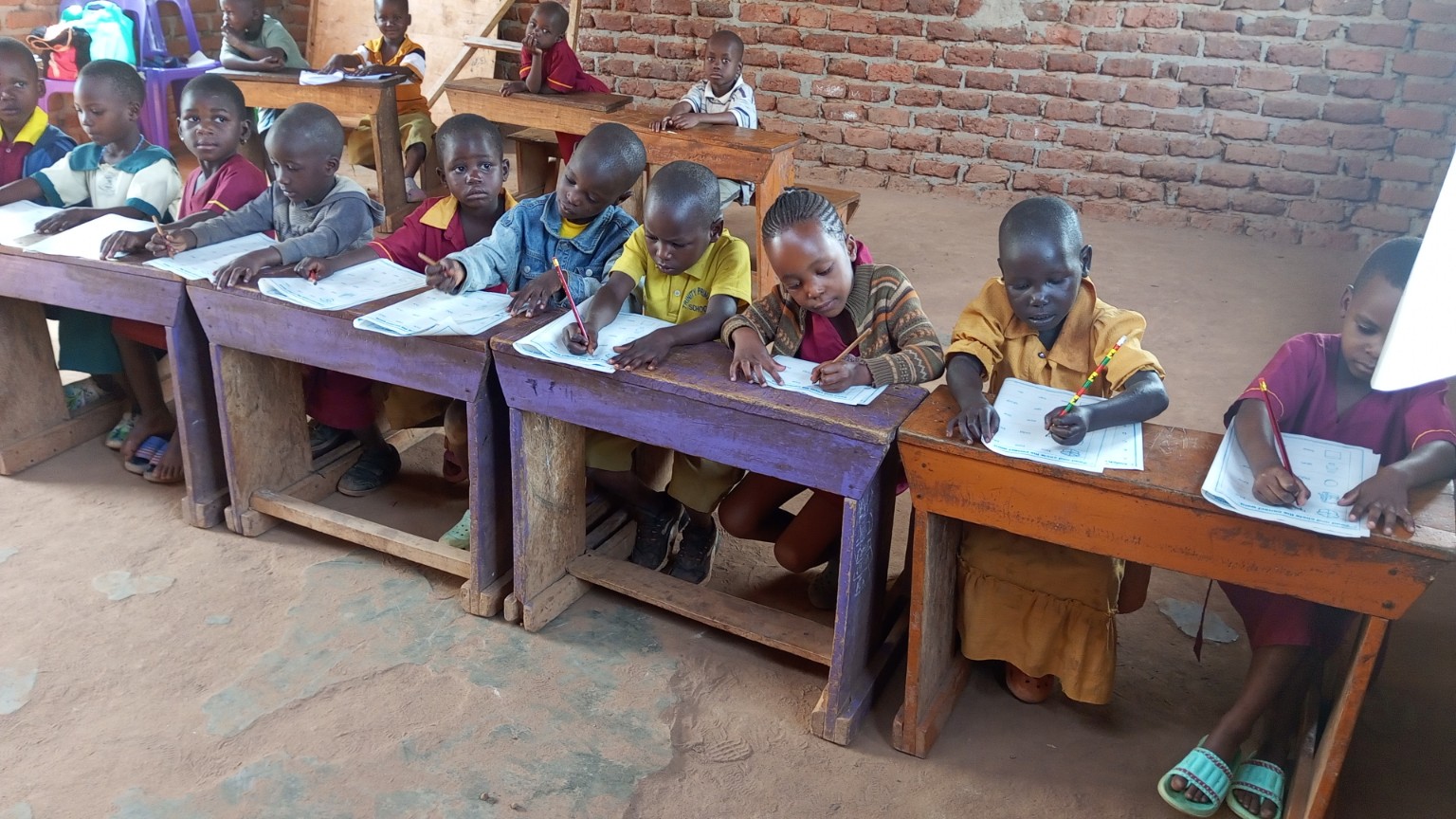 Young learners studying in class